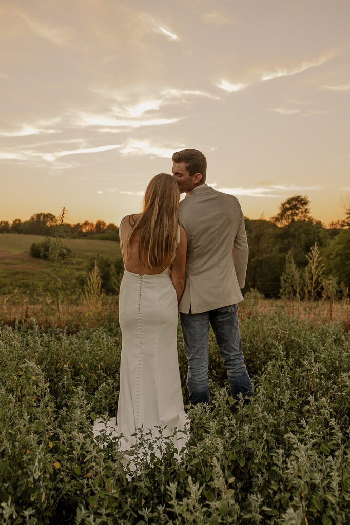 candid and playful bride and groom portraits during sunset