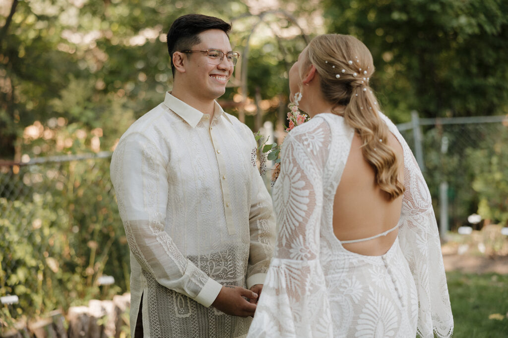 first look with bride and groom outside des moines wedding photos