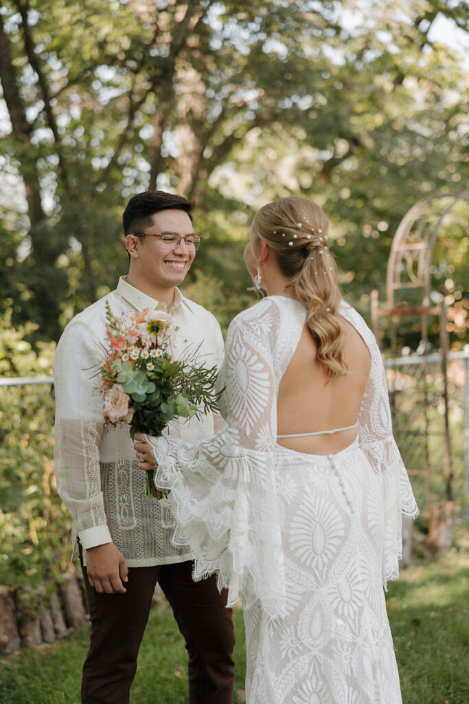 first look with bride and groom outside des moines wedding photos