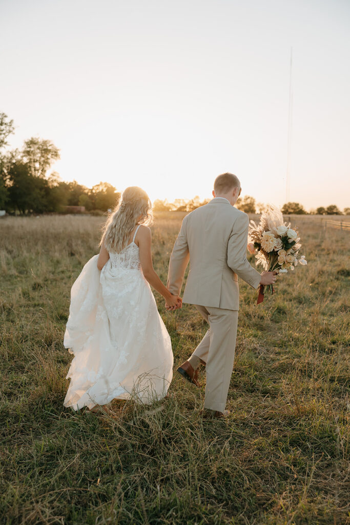 bride and groom first dance underneath disco balls