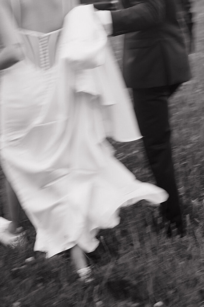 sunset wedding pictures with bride and groom in a vineyard