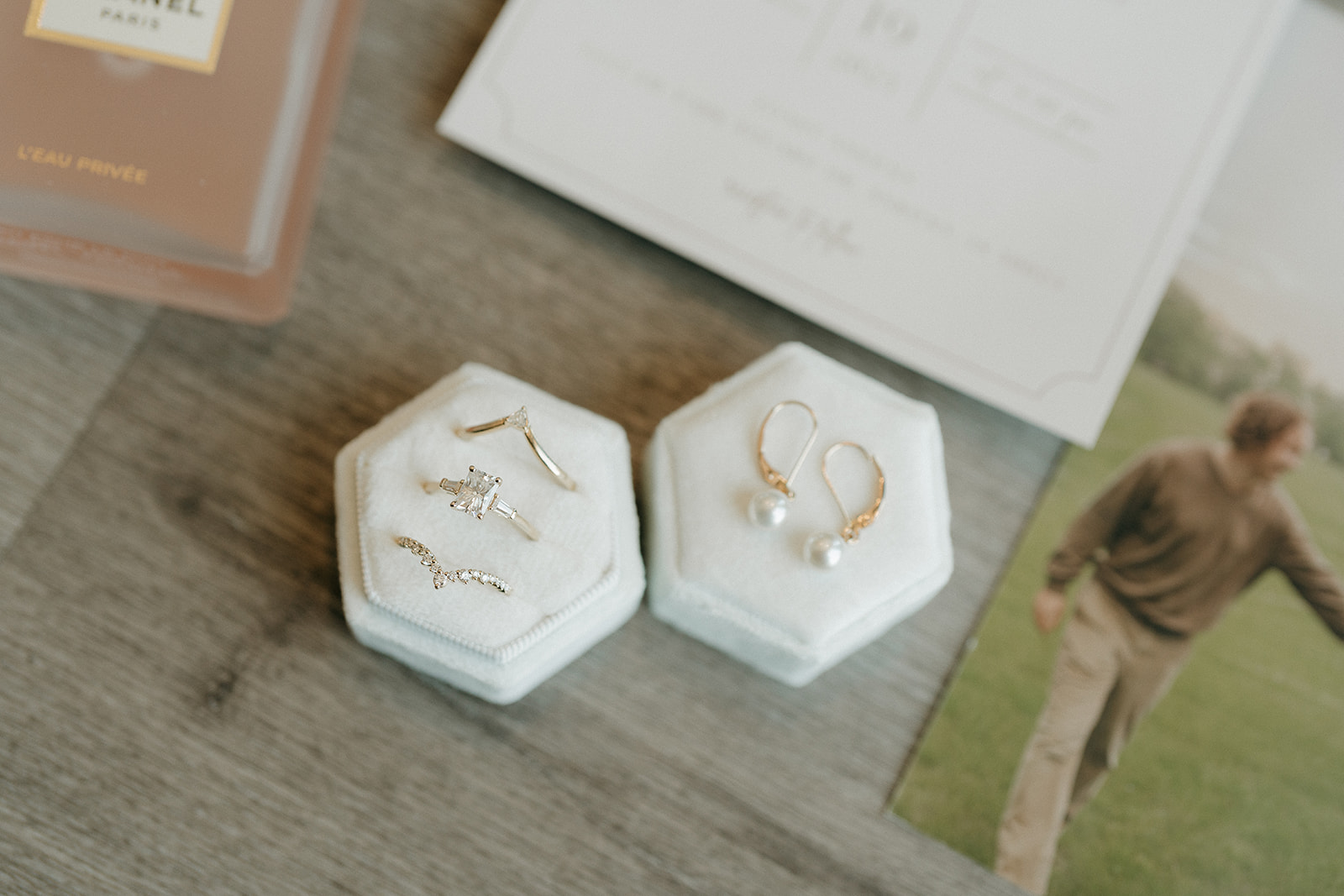 Bride and groom holding hands and walking together on the rooftop terrace, smiling at each other